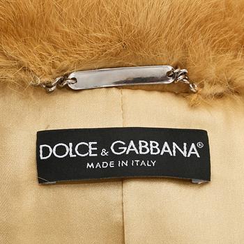 DOLCE & GABBANA, a yellow rabbit fur jacket. Size 38.