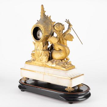 A Louis XVI-style gilt zink and marble mantel clock, later part of the 19th Century.