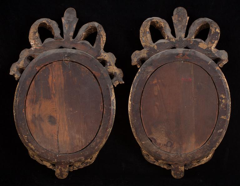 A pair of Gustavian two-light girandole mirrors by N. Falkengren.