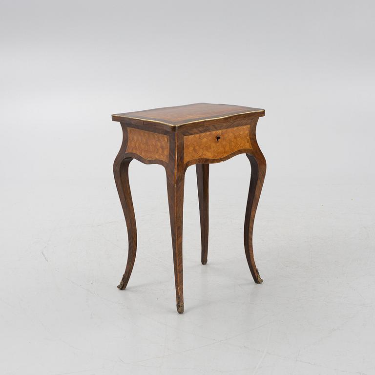 A Louis XV-style sewing table, 19th century.