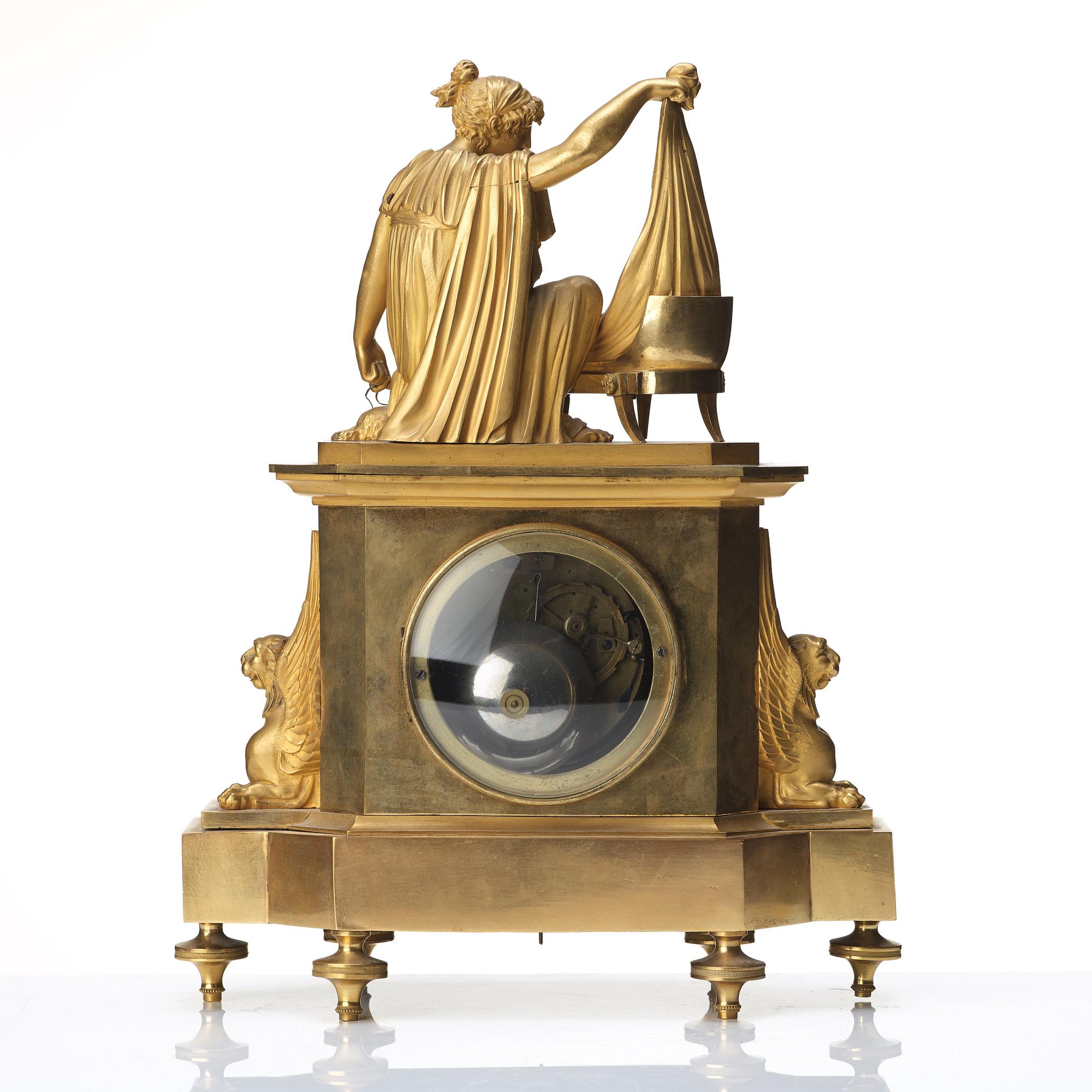 A Empire early 19th century gilt bronze mantel clock.