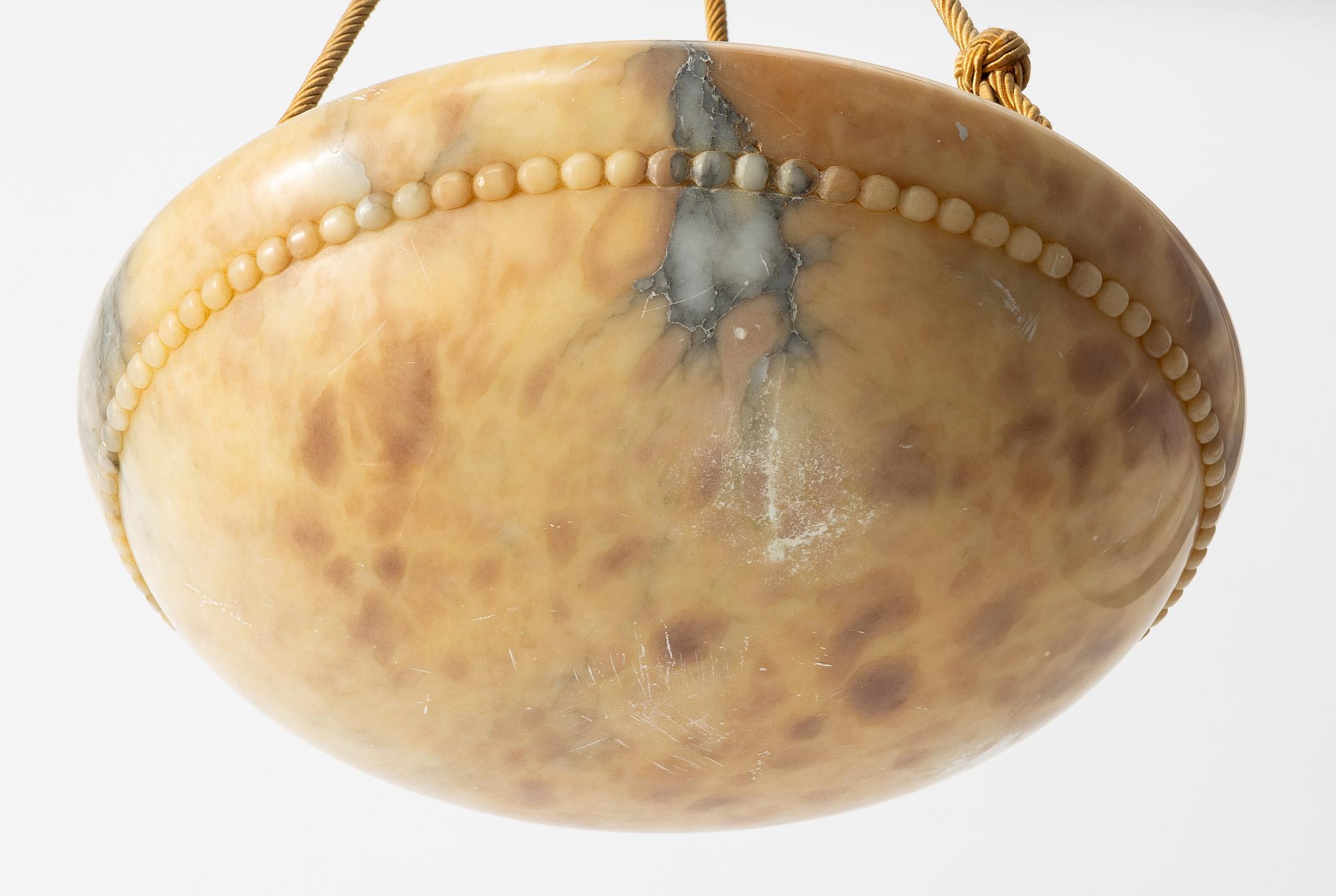 Takampel, alabaster, 1920-tal.