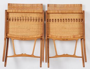 Hans J. Wegner, a pair of oak and rattan folding chairs 'JH-512', Johannes Hansen, Denmark 1950-60s.