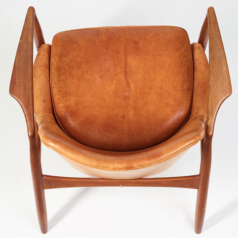 Ib Kofod-Larsen, a "Seal" teak and brown leather armchair, Olof Persson Möbler, Jönköping, Sweden 1950-60's.