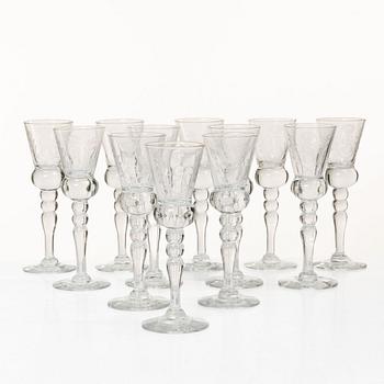 A set of 12 schnaps glasses by Reijmyre Glassworks with king Gustav III emblem.