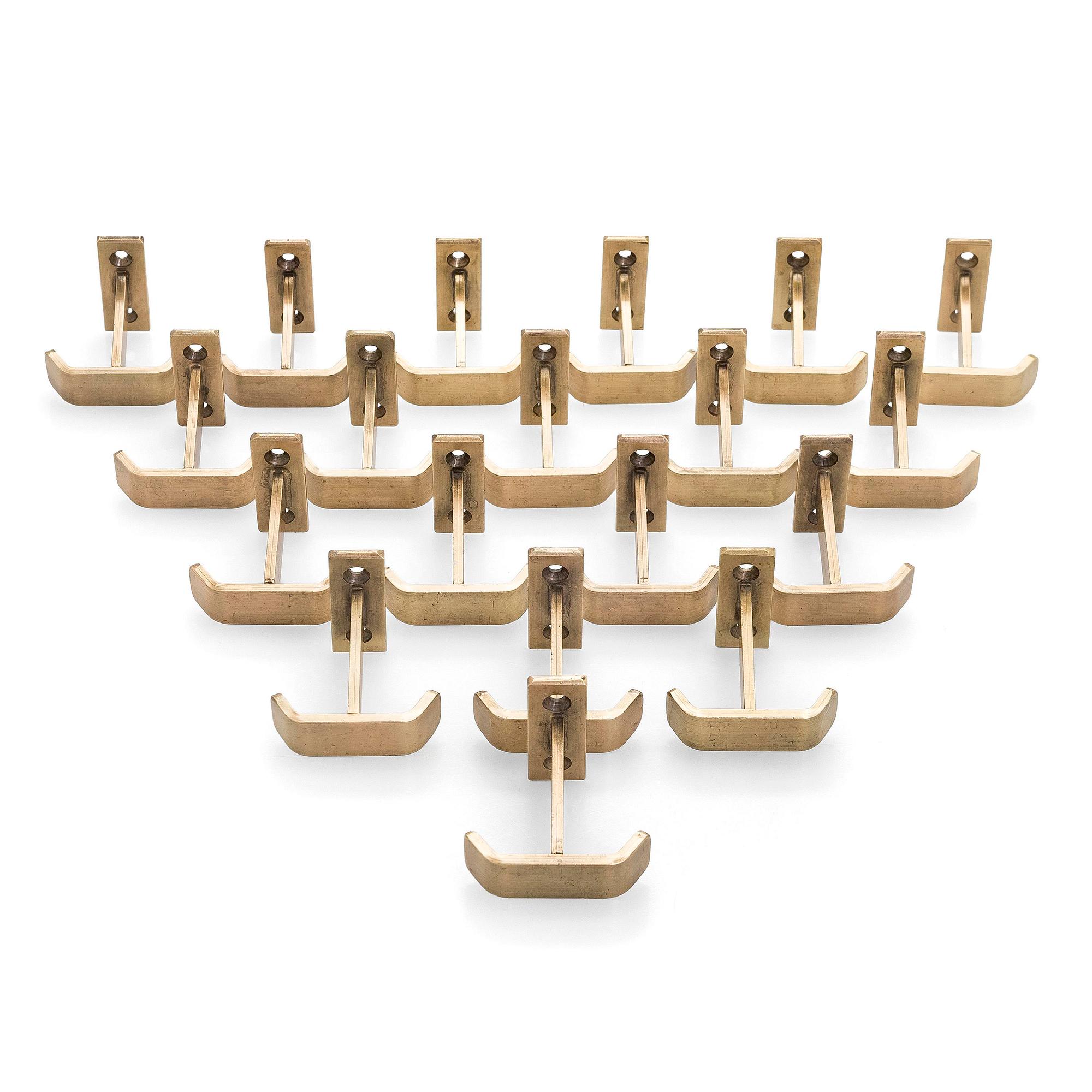 A set of 19 coat hooks, 1960s/70s.