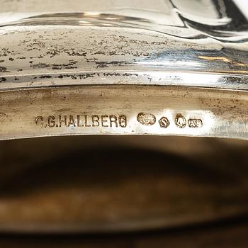 A silver coffee pot, cream jug and sugar bowl, Swedish import mark of CG Hallberg, Stockholm 1927.