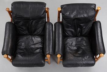 A pair of 'Amiral' easy chair by Eric Merthen.