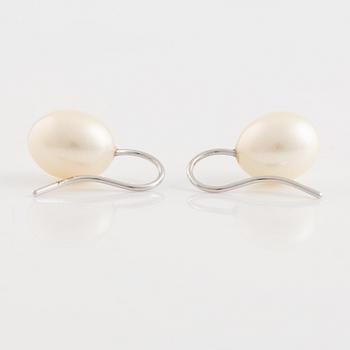 A pair of white gold earrings with cultured pearls.