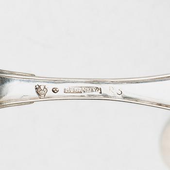 Bengt Törnberg, forks, 12 pcs, and Stephan Westerstråhle and Niklas Ramberg, spoons, a pair, early 19th century.