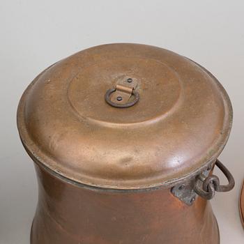 A COPPER BUCKET AND TWO MILK CHURNS, 19th century.