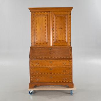 A writing cabinet, probably from Småland, first half of the 19th century.