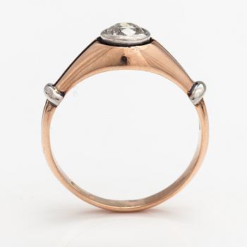 A 14K gold ring with a ca. 0.66 ct old-cut diamond.