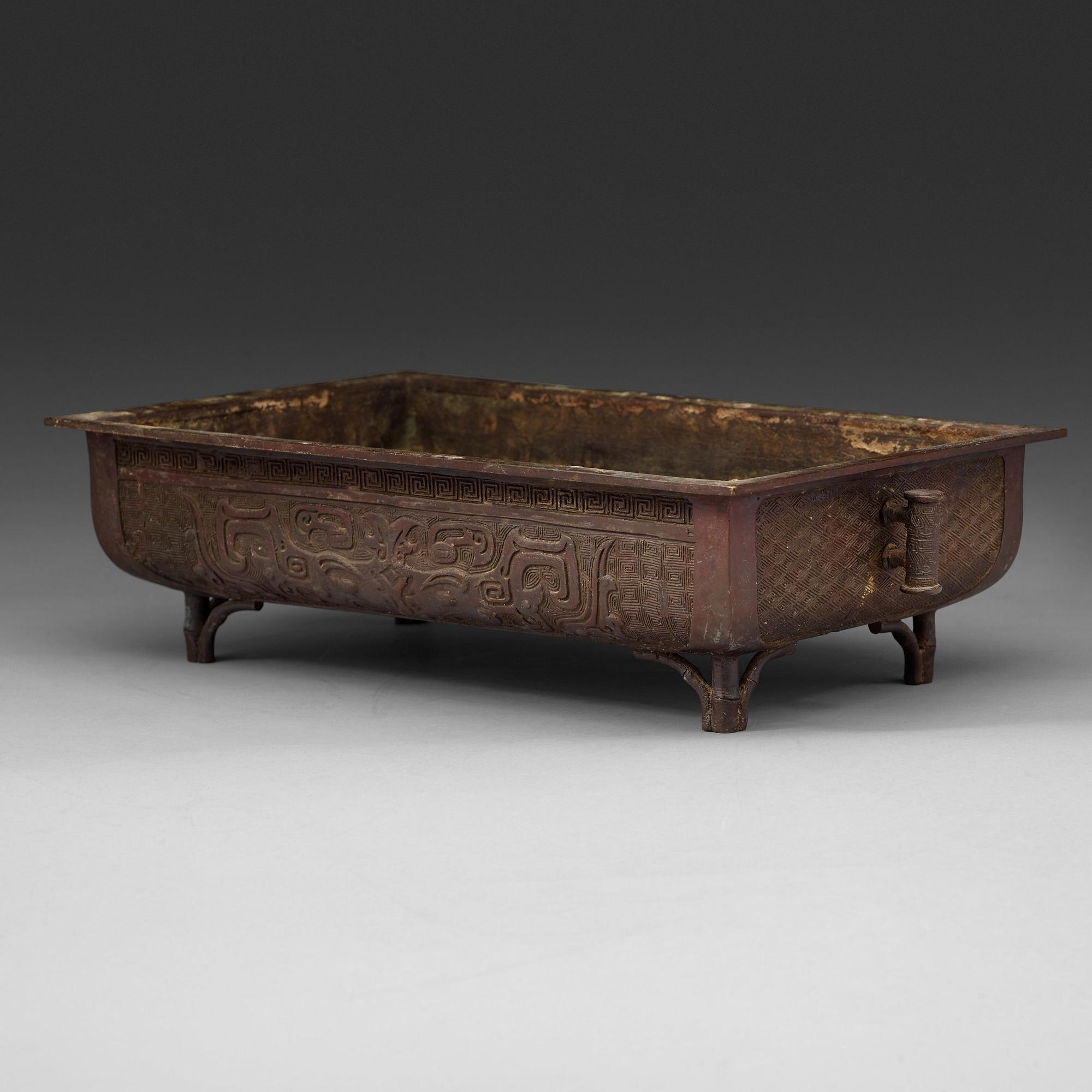 A large Japanese bronze flower pot, Meiji (1868-1912).