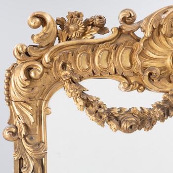A Rococo style mirror, 19th Century.
