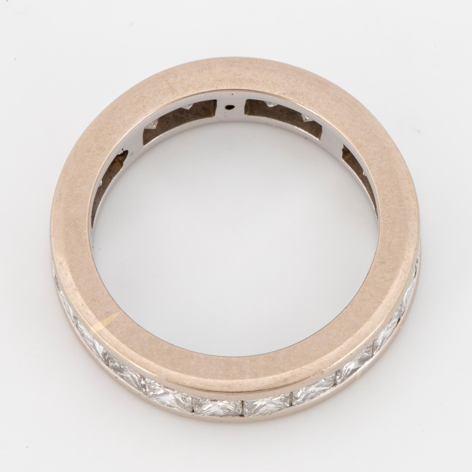 Princess-cut diamond eternity ring.