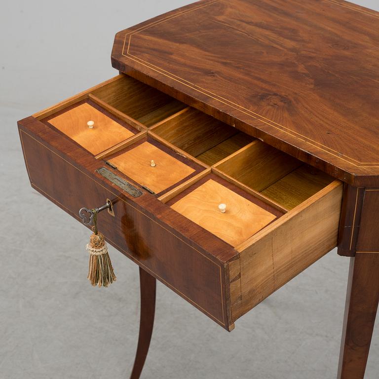 A second half of the 19th century mahogany veneered table.