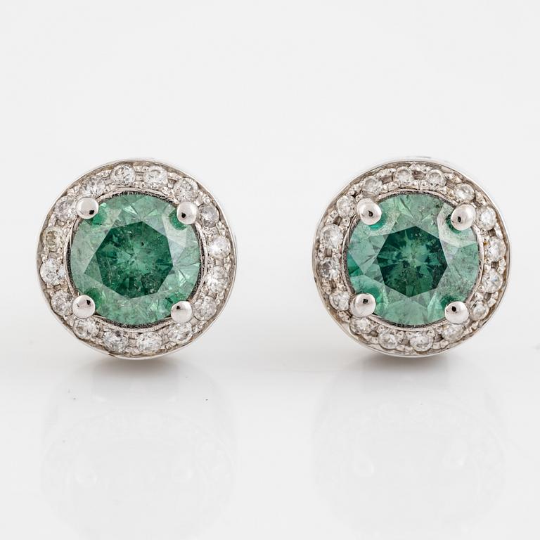 Colour treated brilliant cut diamond earrings.