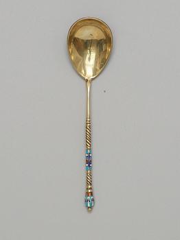 A Russian silver-gilt and enamel spoon, unidentified makers mark, Moscow 1899-1908.