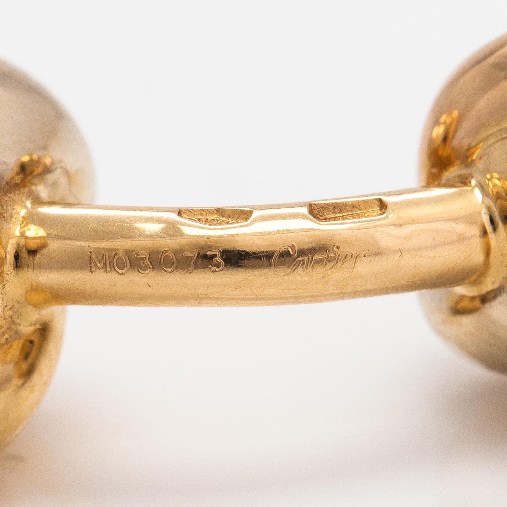 Cartier, A pair of 18K gold "Trinity" cufflinks. Marked Cartier M03073.