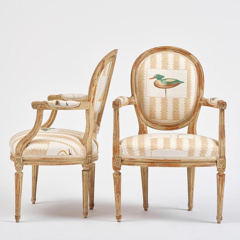 A pair of French Louis XVI children's open armchairs, late 18th century.