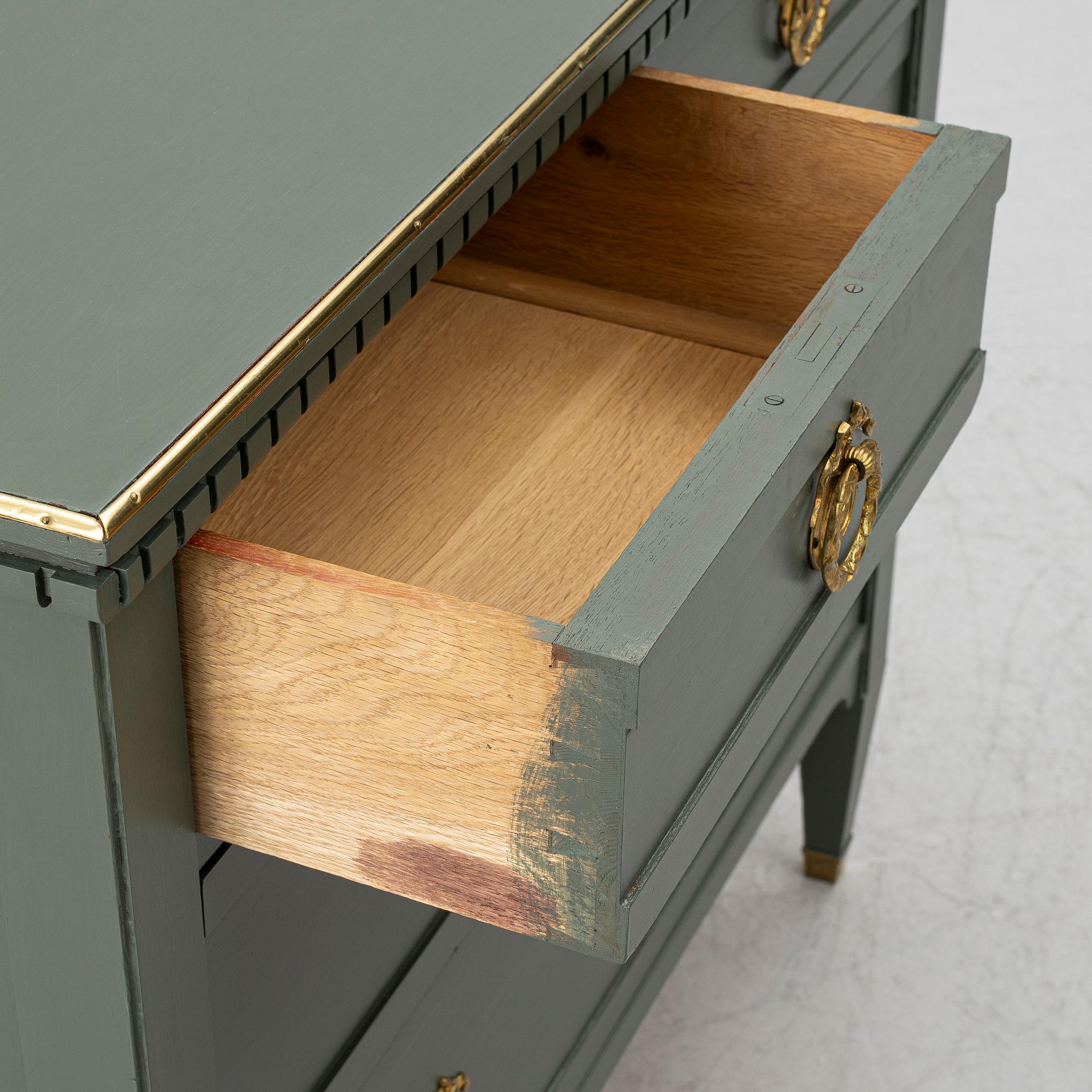 A Gustavian style chest of drawers, circa 1900.