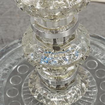 A glass floor lamp.