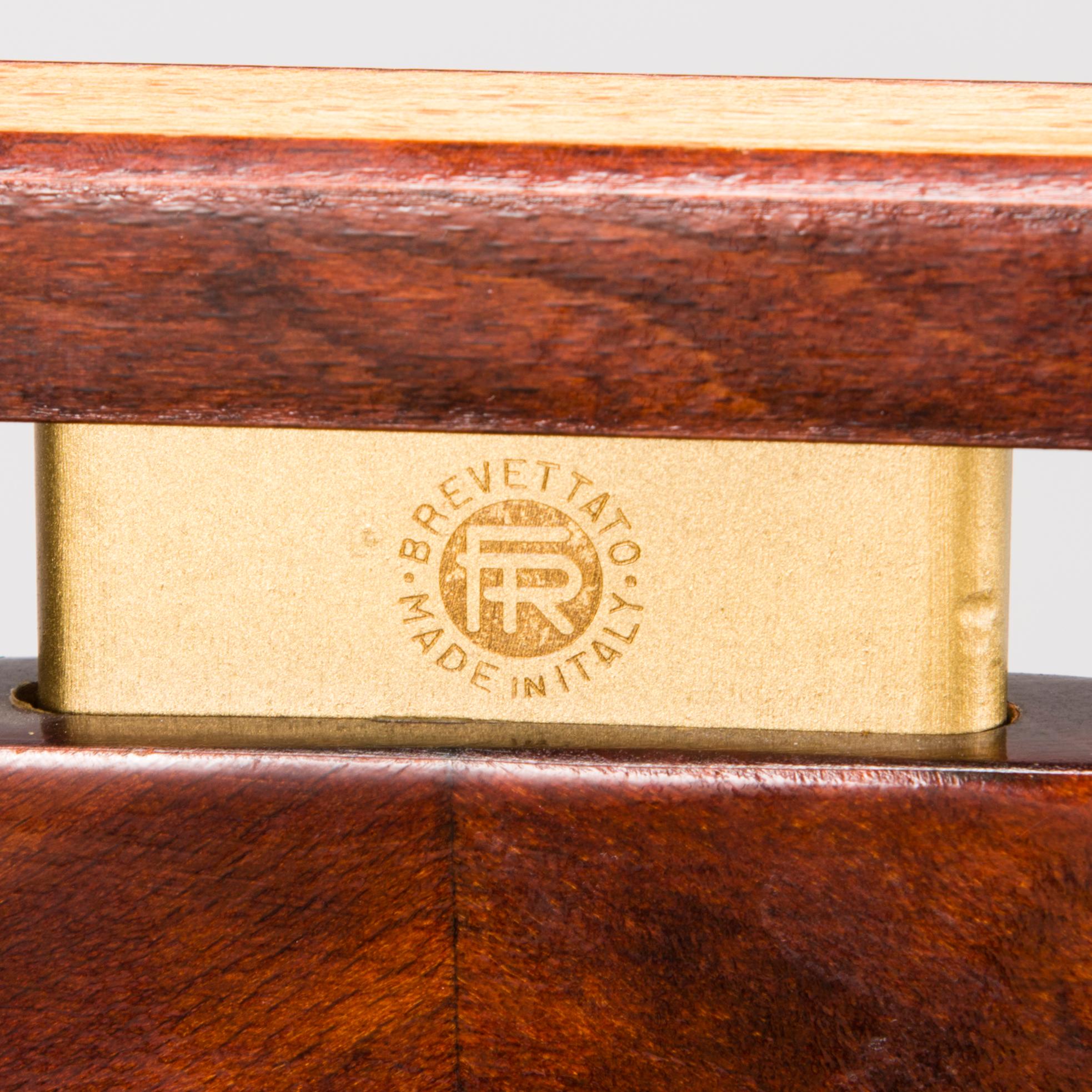 An Italian Fratelli Reguitti valet stand from the latter half of 20th century.