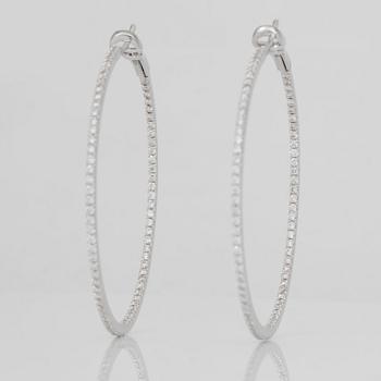A pair of brilliant-cut diamond hoop earrings. Total carat weight circa 1.80 cts.