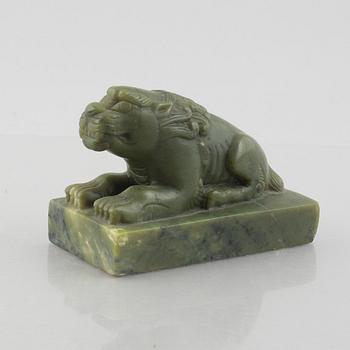 A Chinese stone figure of a lion, 20th century.