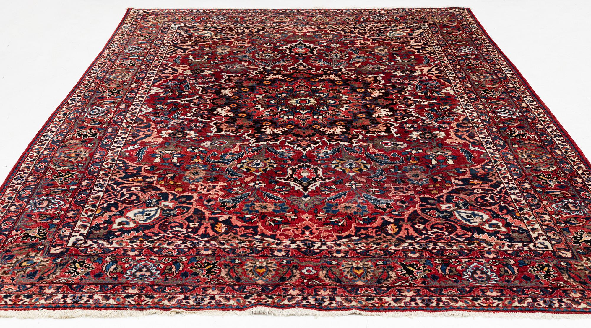 A Persian carpet. ca 400 x 260 cm.