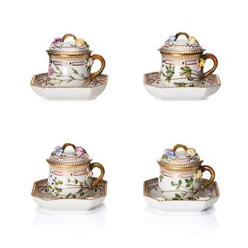 A set of 4 Royal Copenhagen 'Flora Danica' custard cups with covers and stands, Denmark, 20th Century.