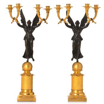 98. A pair of French Empire four-light candelabra, attributed to Francois Rabiat (bronze maker in Paris 1756-1815).