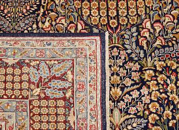 A 'Millefleur' Kerman carpet, c. 393 x 266 cm.