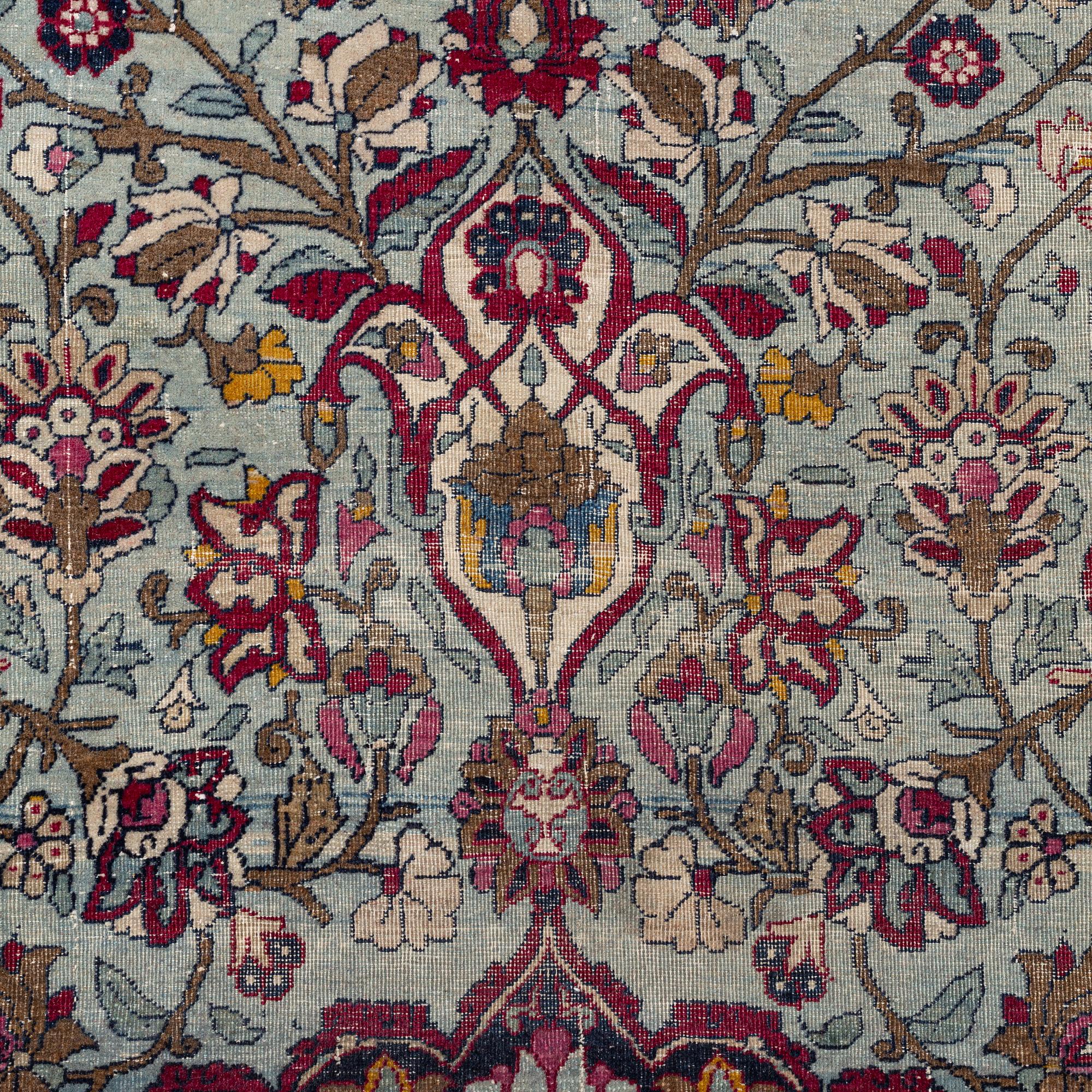 An antique Isfahan carpet, circa 342 x 250-260 cm.
