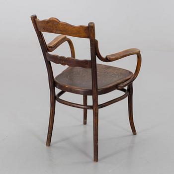 A THONET BENTWOOD ARMCHAIR.