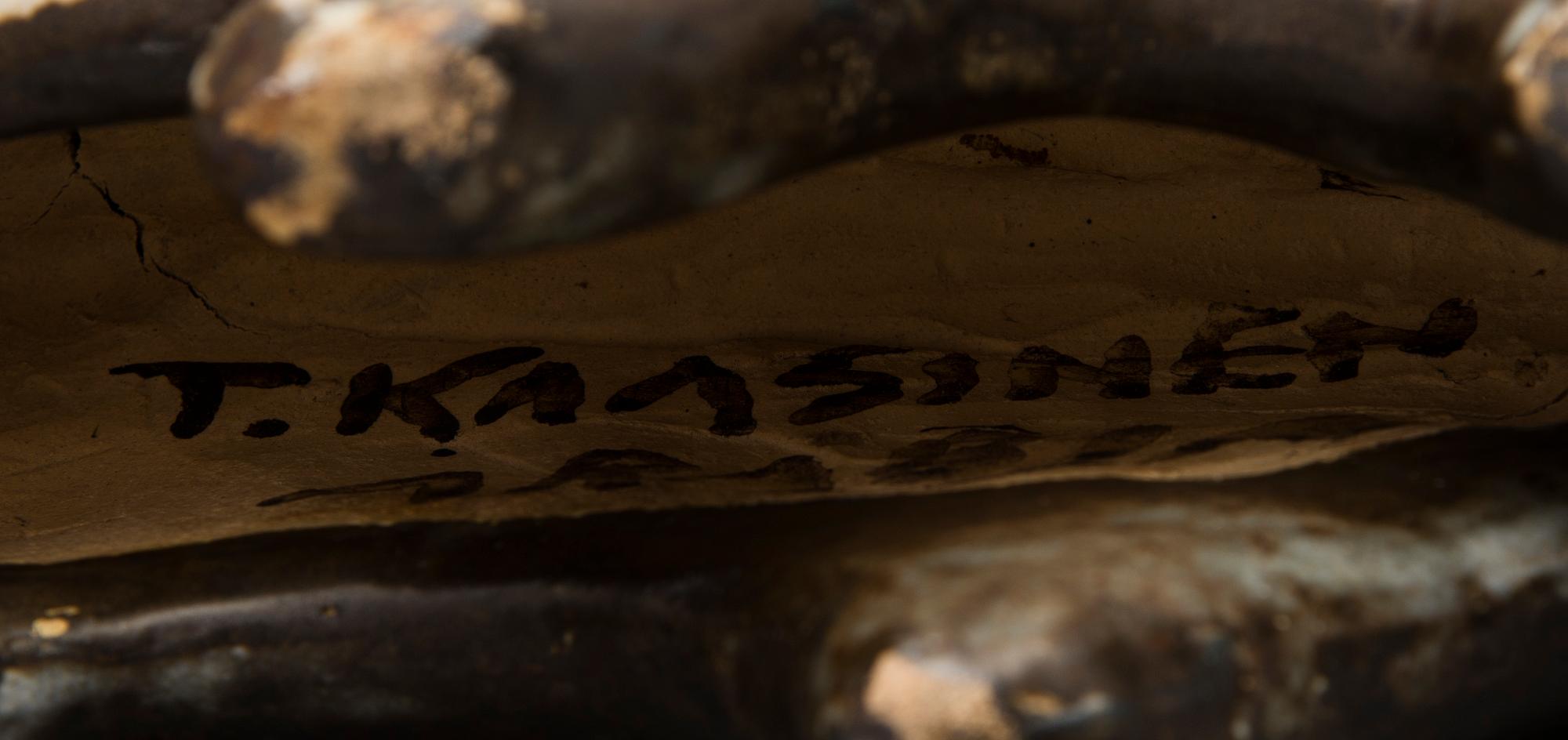 A Ceramic Figurine, signed T Kaasinen Arabia Finland.