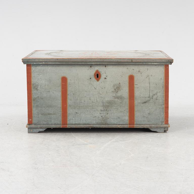 A painted chest dated 1824.