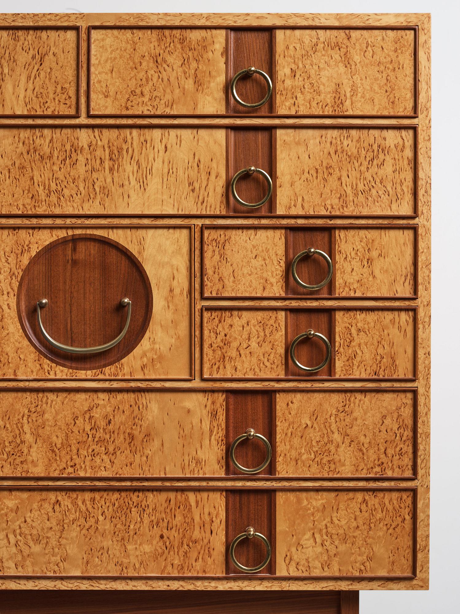 Josef Frank, a birch burrwood and padouck cabinet on stand, model 2215, Svenskt Tenn Sweden probably 1960-70's.