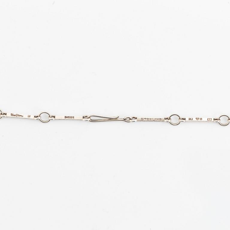 Wiwen Nilsson, a silver and rock crystal necklace.