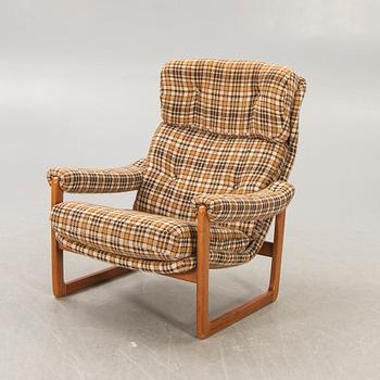 An Inge Andersson walnut "Draken" easy chair late 1960s.