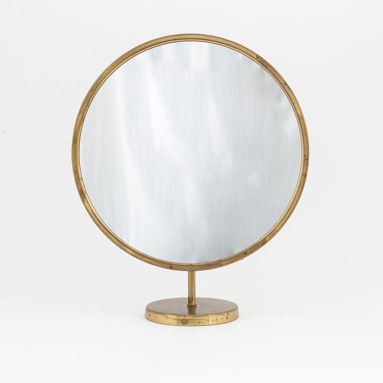 A Swedish Modern brass table mirror, 1940's/50's.