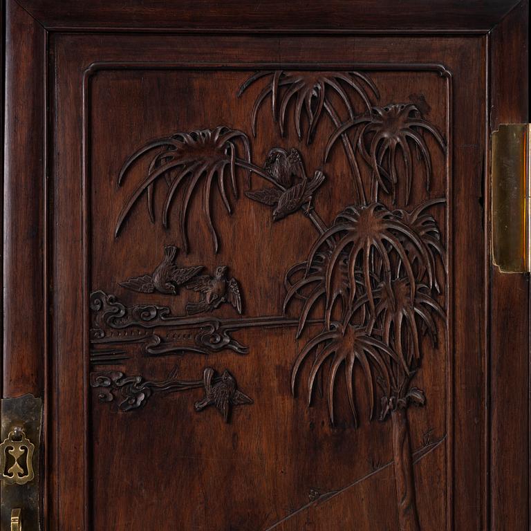 A hardwood cabinet, China, 20th century.