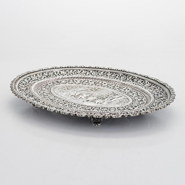 A silver salver, marked OM BHUJ for Oomersi Mawji, Bhuj, Kutch, India, circa 1860-1890.