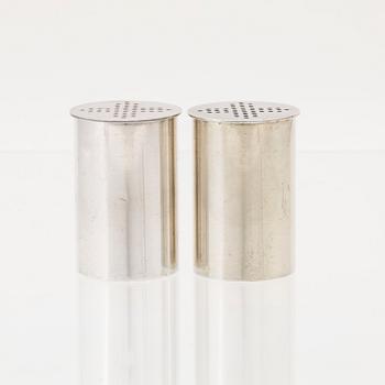 A pair of silver and guilded silver salt and pepper shakers by Wiwen Nilsson, Lund 1957-58.