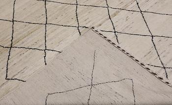 A Moroccan carpet, 235 x 158 cm.