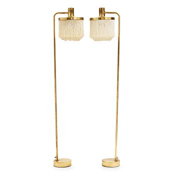 Hans-Agne Jakobsson, a pair of brass and tassel floor lamps for Markaryd AB Sweden, 1960-70's.