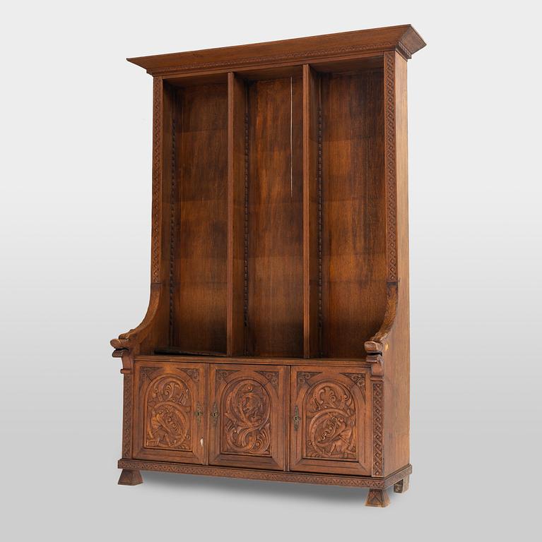 Bokhylla, omkring år 1900.