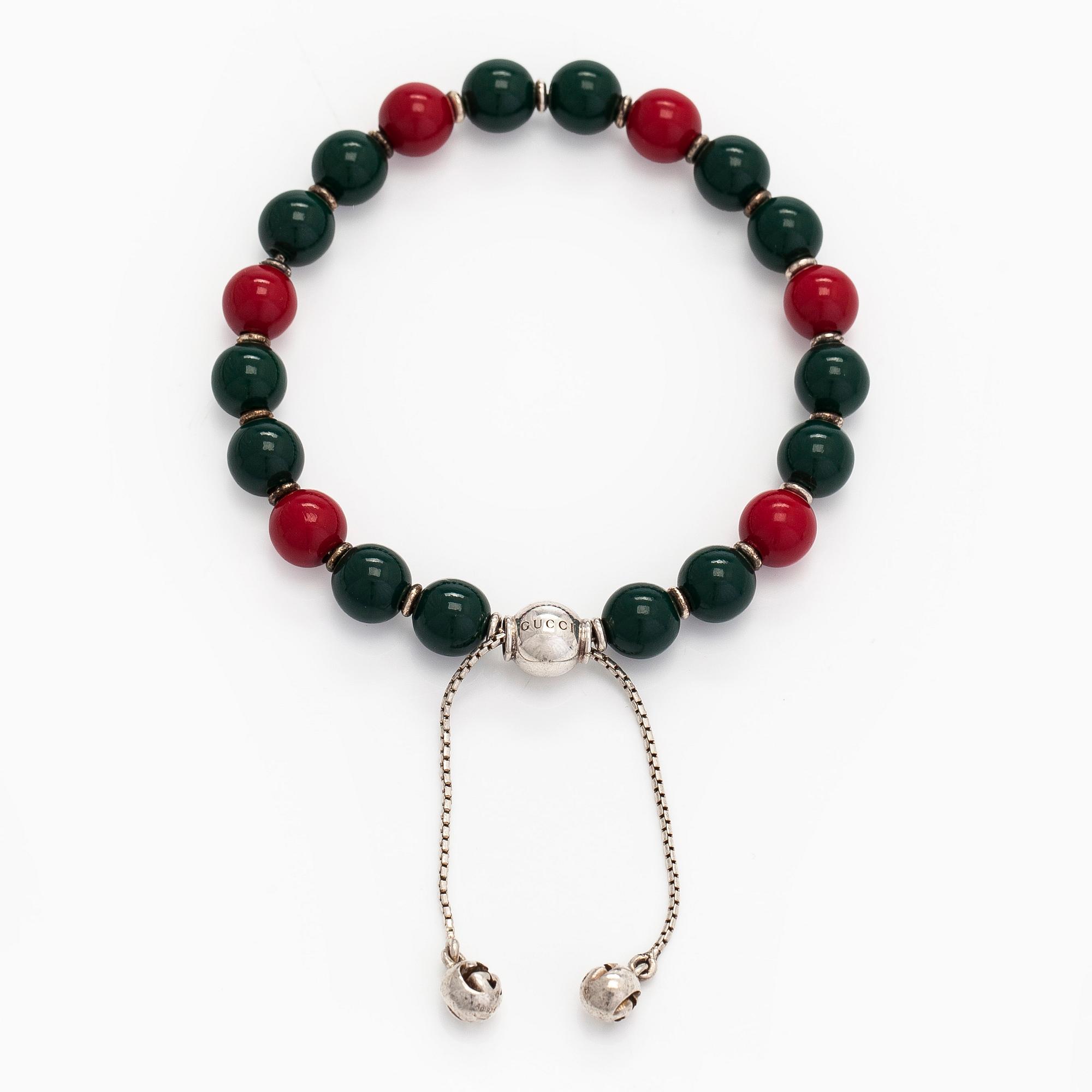 Gucci, a 'Boule Britt"' bracelet.