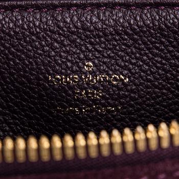 Louis Vuitton, a Monogram Empreinte 'Audacieuse' bag.
